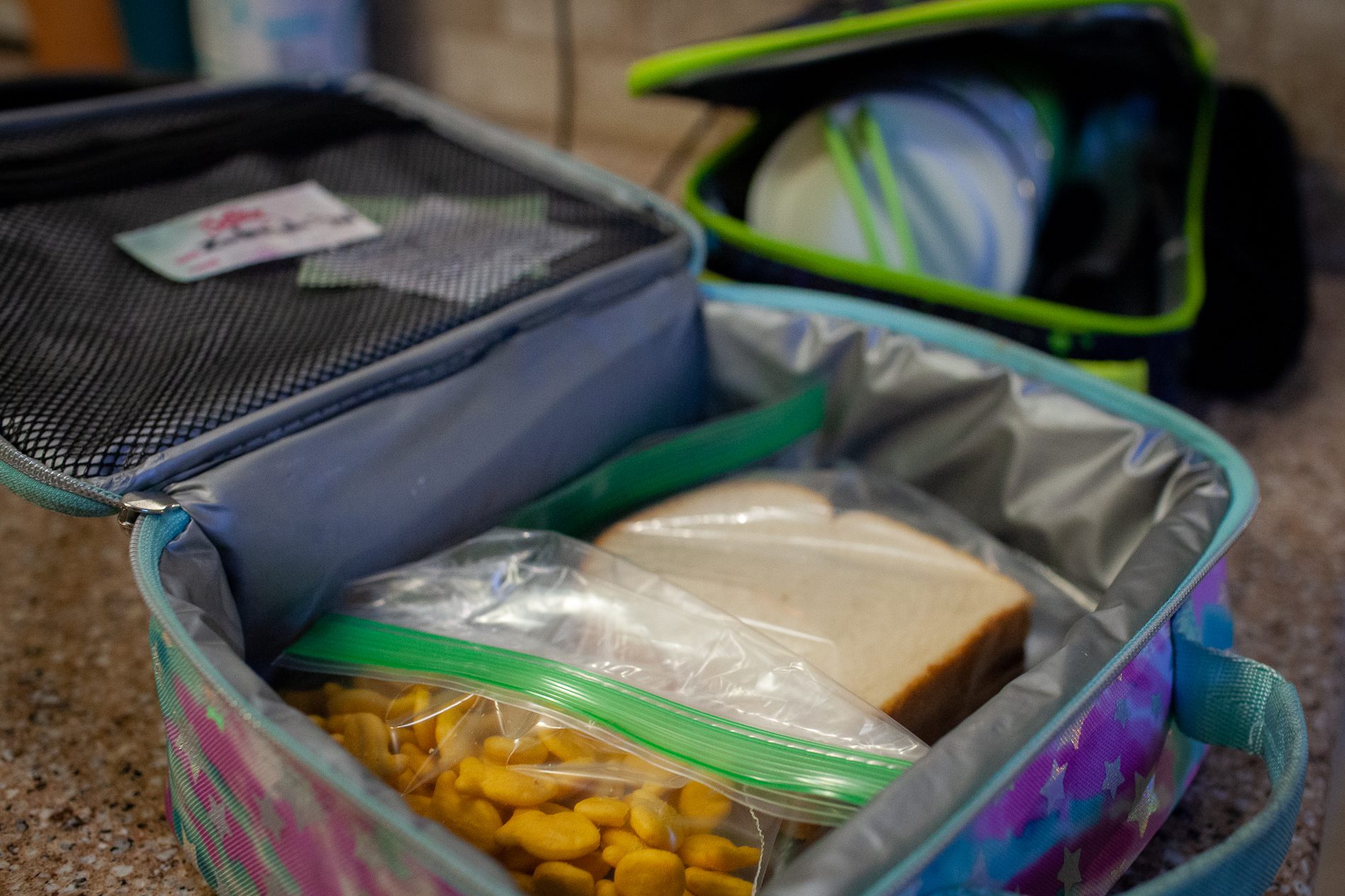 On most days Huma Quadri makes lunch for her children, Zubeida and Yasir Syed, before they head to their schools, Churchill Elementary School and Hadley Junior High School respectively, from their home in Glendale Heights, Ill., Nov. 11, 2022. Photo by Michelle Kanaar/Borderless Magazine